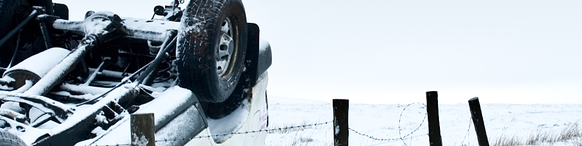 Overturned vehicle in wintery conditions